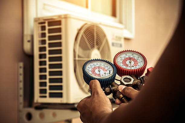 Professional Hvac technician working in East Moriches, NY